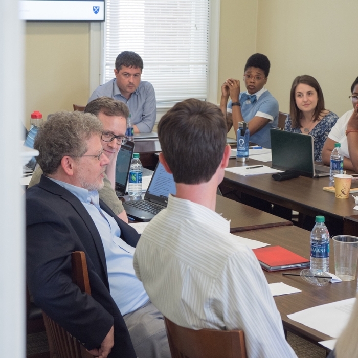 People sitting around a table during a meeting