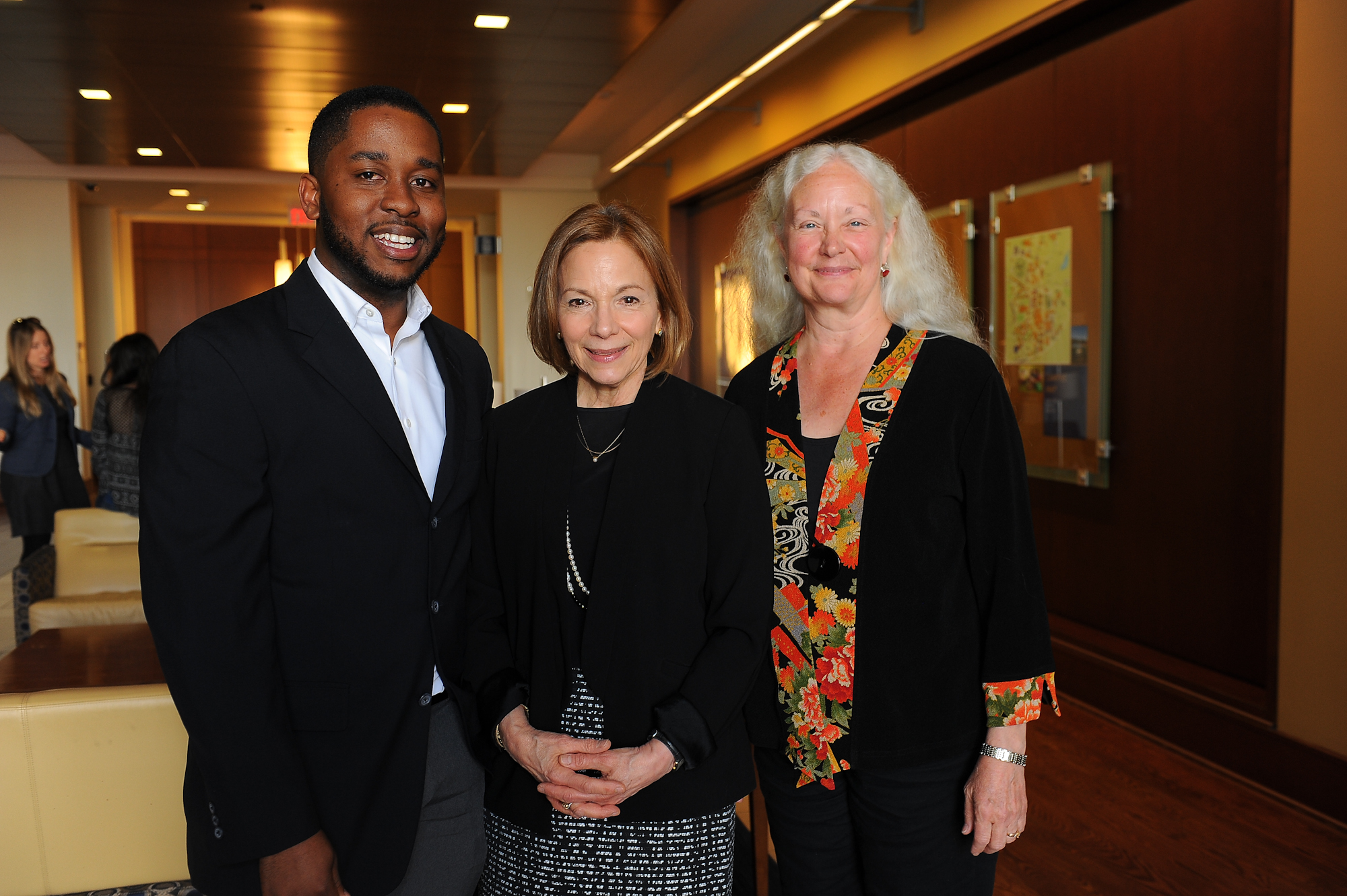 Graduate Osric Forrest, Dean Lisa Tedesco, Professor Patricia Bauer